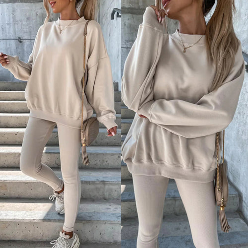Damesporty fritidssett med casual oversized genser og tettsittende tights Skjora
