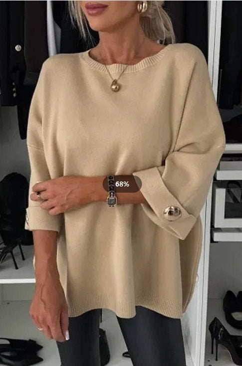 Kvinne Elegant Strikkegenser med Bred Kutt Ermer og Knappe Detaljer Skjora