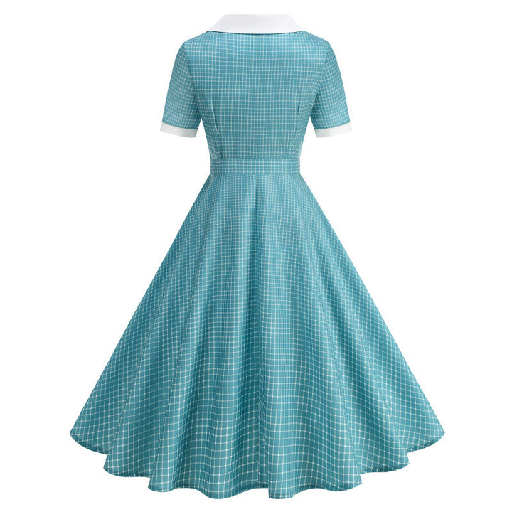 Dame Vintage Polka-Dot Kjole med knappdetaljer og svajende skjørt Skjora