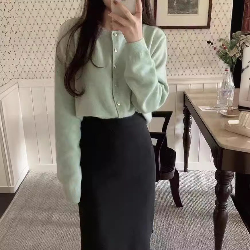 Kvinne Elegant Cardigan med Hjerteknapper og Fin Ribbestruktur Skjora