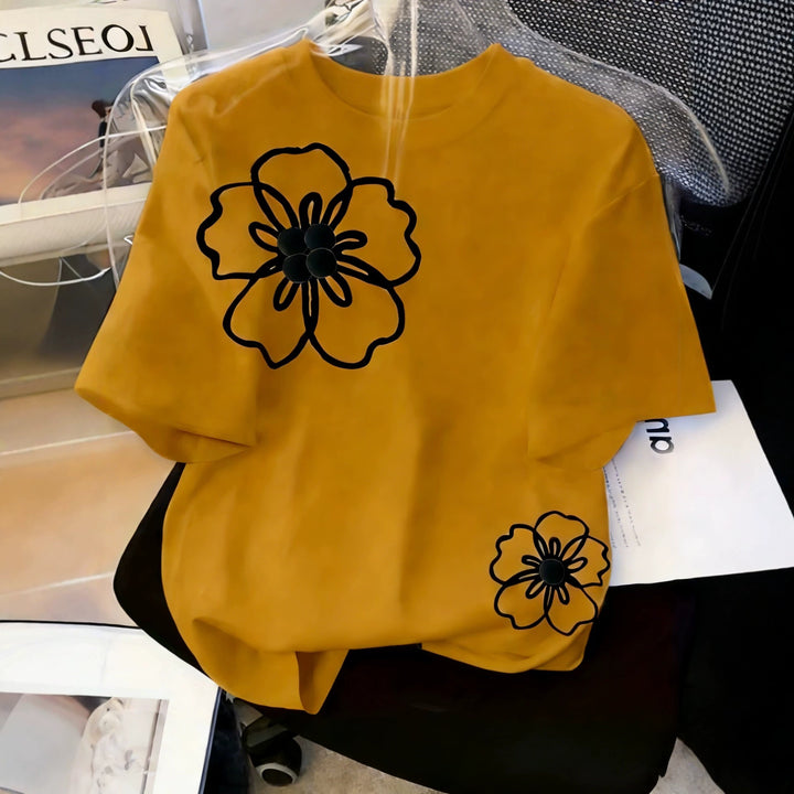 Dame T-skjorte med blomstret design og løs passform Skjora