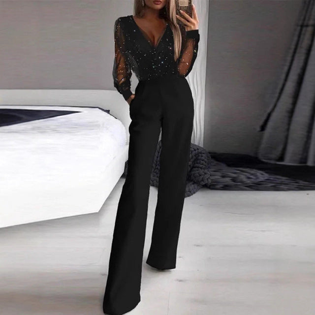 Damer Elegant Jumpsuit med Transparent Bluse og Glitrende Akcenter Skjora