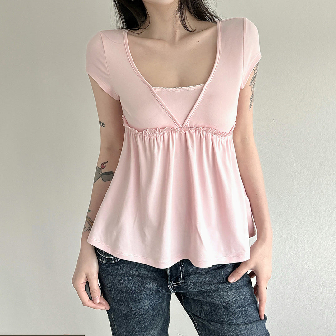 Dame luftig omslagsbluse med elastisk midje og dekorative volangdetaljer Skjora