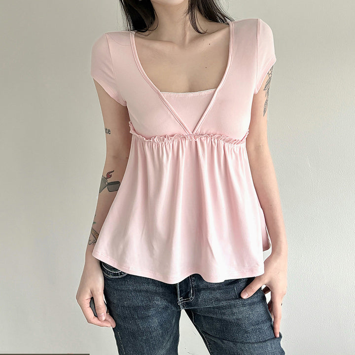 Dame luftig omslagsbluse med elastisk midje og dekorative volangdetaljer Skjora