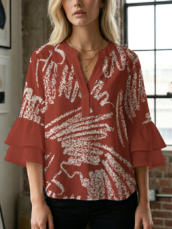 Damer elegant bluse skjorte med voluminøse rysjermer og grafisk blomsterdesign Skjora
