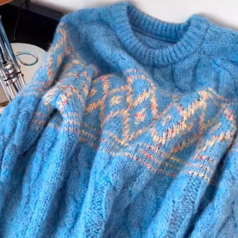 Kvinnens chunky strikkegenser med nordisk mønster og mykt materiale Skjora