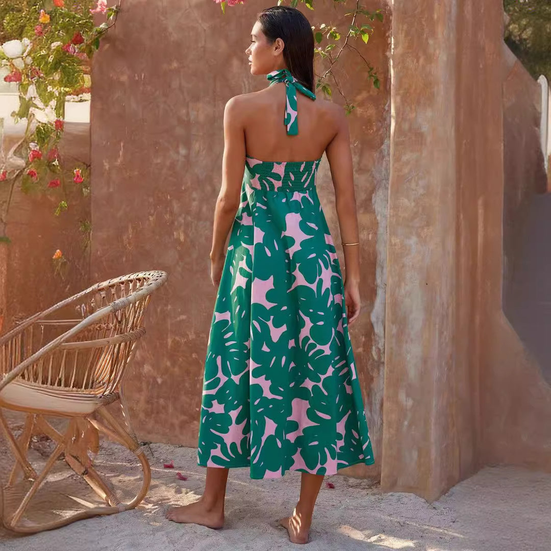 Kvinne maxi kjole med blomster bandeau design og elegant utsvingt skjørt