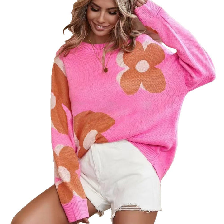 Kvinnenes chunky strikkegenser med livlig blomsterdesign og rund hals Skjora