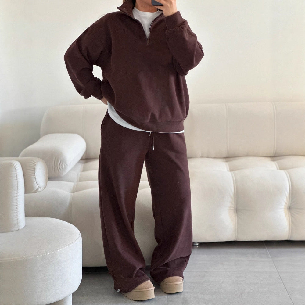 Kvinne behagelig fleece zip hettegenser med en avslappet fasong og vide ermer