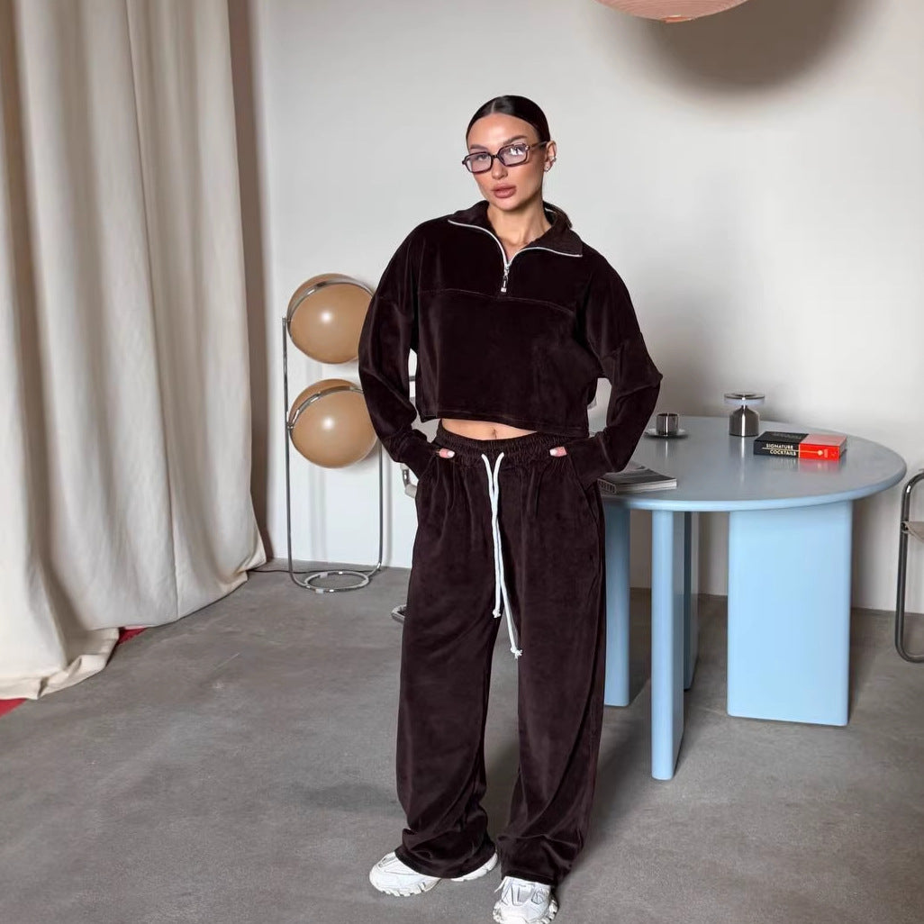 Kvinne kort sweatshirt med halv glidelås og brede bukser Skjora
