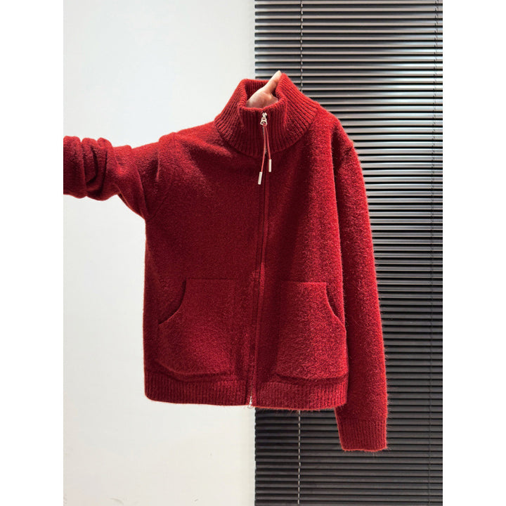Kvinnens termisk cardigan med høy krage og to praktiske lommer.