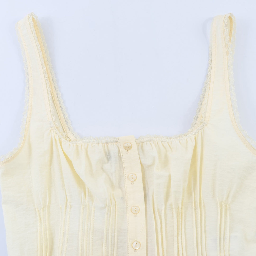 Dame-Crop-Top med fine folder og pynteknapper Skjora