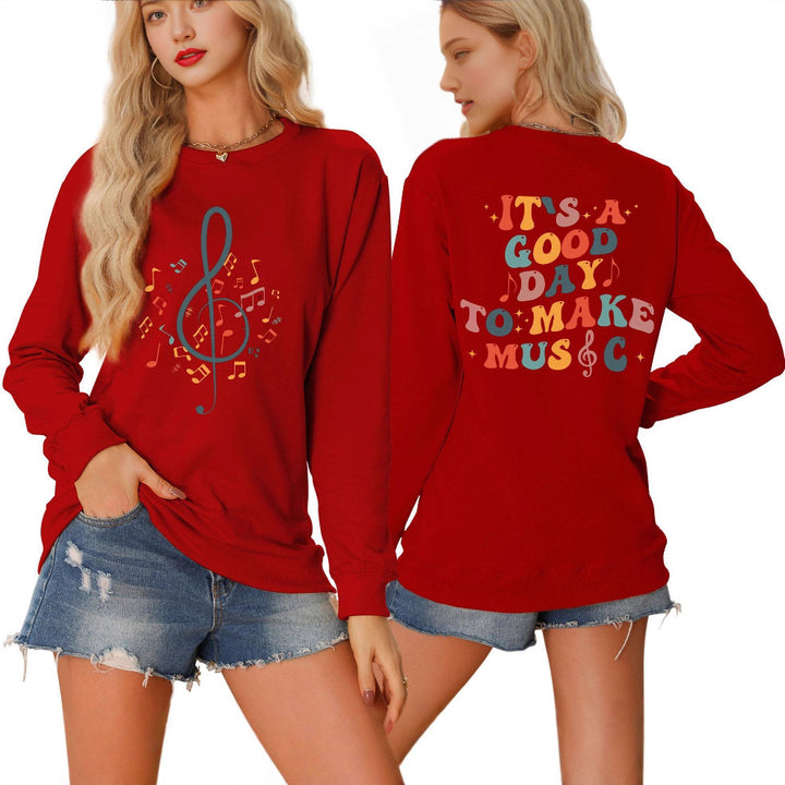 Dame sweatshirt med musikalsk motiv og kreativ skrift Skjora