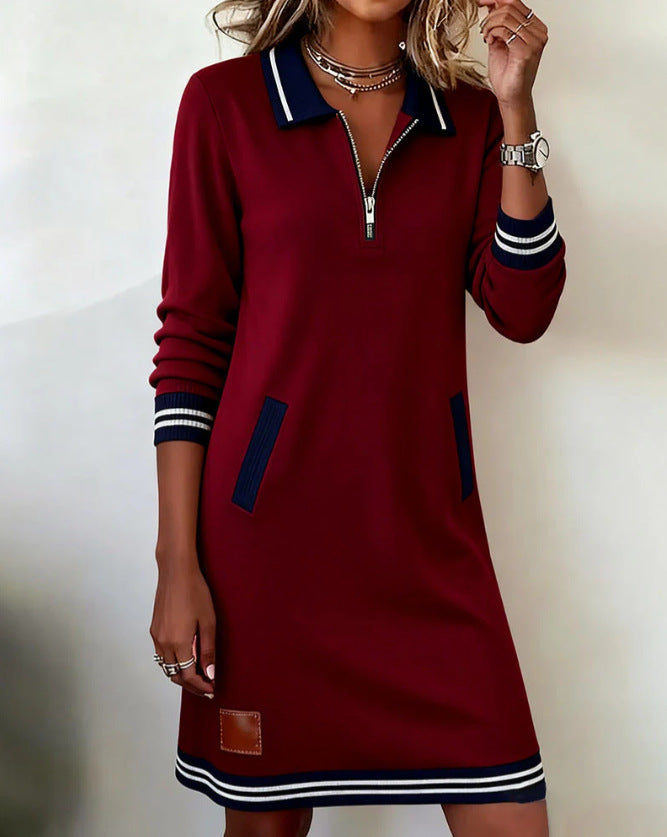 Women's polo dress in a sporty look with decorative zipper and side pockets Skjora
