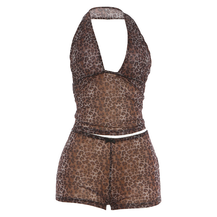 Dame avslappet jumpsuit med leopardmønster og dekorative detaljer Skjora