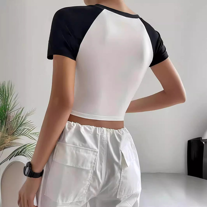 Dame crop-top med motiverende tekst og avslappet snitt Skjora