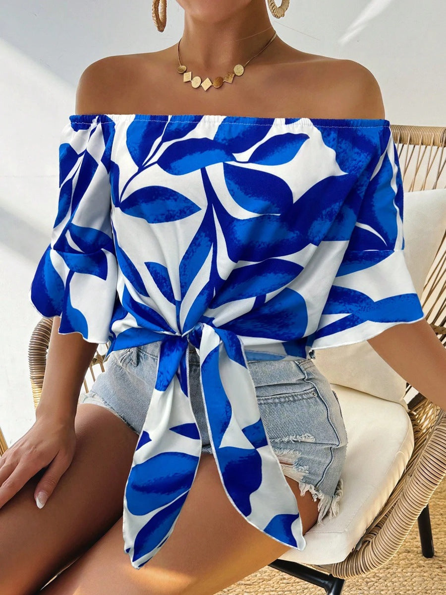 Dame Off-Shoulder Bluse med floralt mønster og justerbar knute Skjora