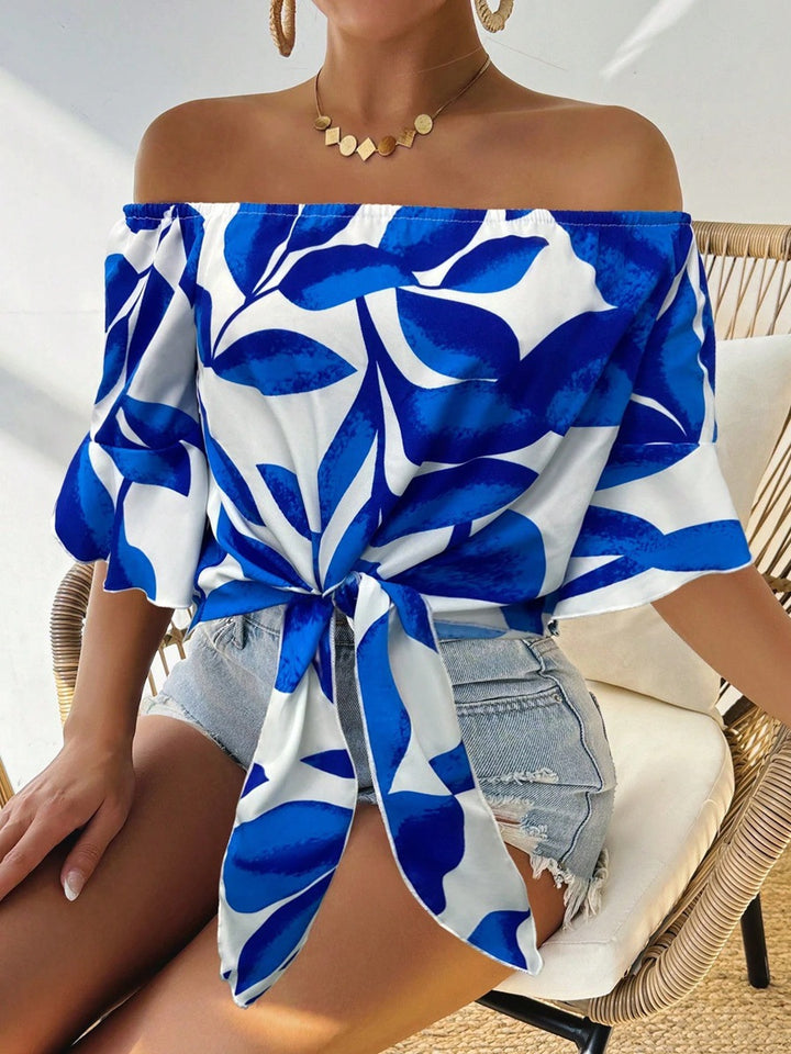 Dame Off-Shoulder Bluse med floralt mønster og justerbar knute Skjora