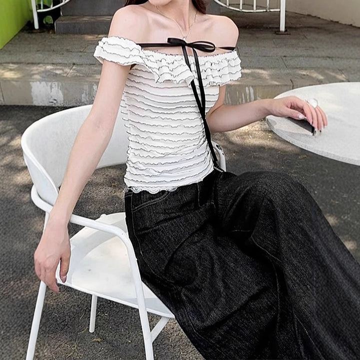 Dame Offshoulder-bluse med elegant bølgemønster Skjora