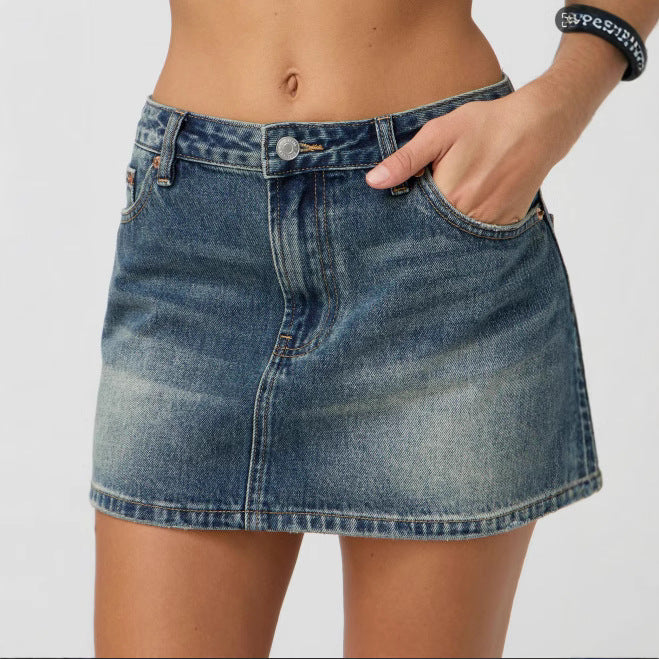 Dame Denim-miniskjørt med fashionable lommer og klassisk snitt Skjora