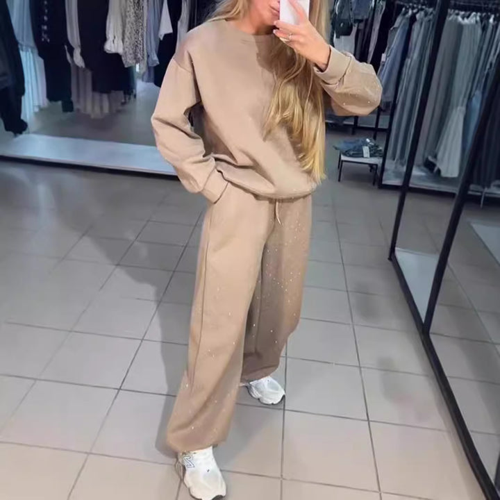 Kvinnelig sporty loungedress med glitrende detaljer og løs passform Skjora
