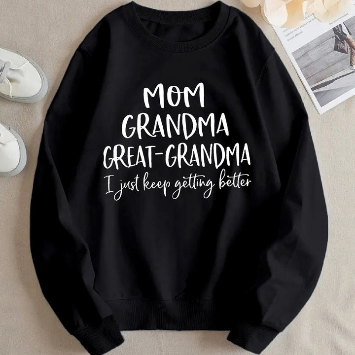Dame sweatshirt med kreativ familieprint og komfortabel passform Skjora