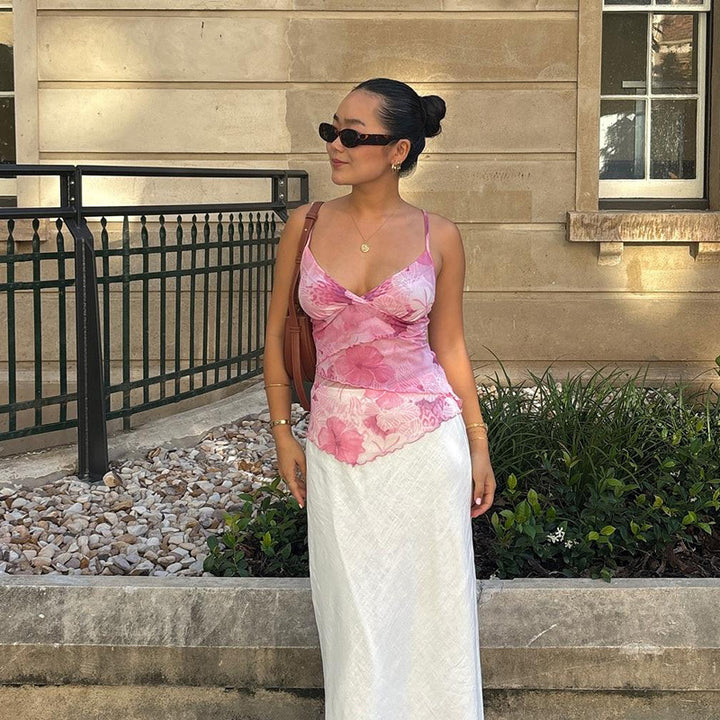 Kvinne chiffon topper med blomstermønster og elegant omslagsutseende