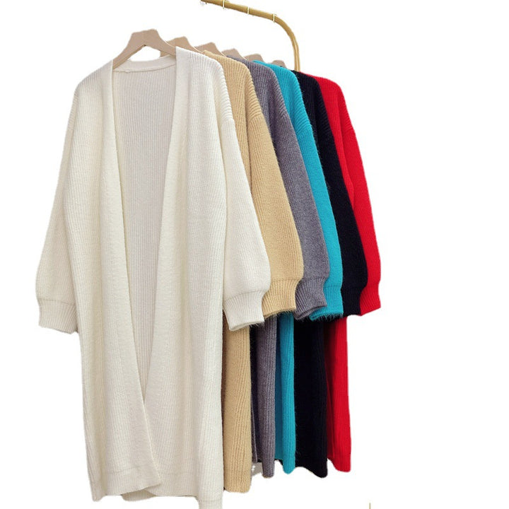 Kvinnens langermede strikket cardigan med mykt og voluminøst materiale Skjora