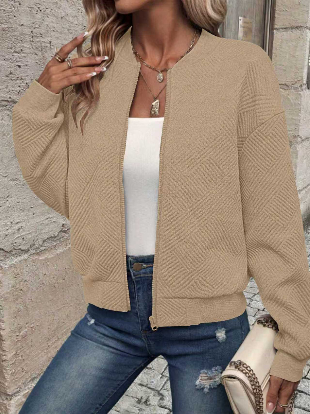 Damers fashionable sweatjakke med teksturdesign og glidelås Skjora