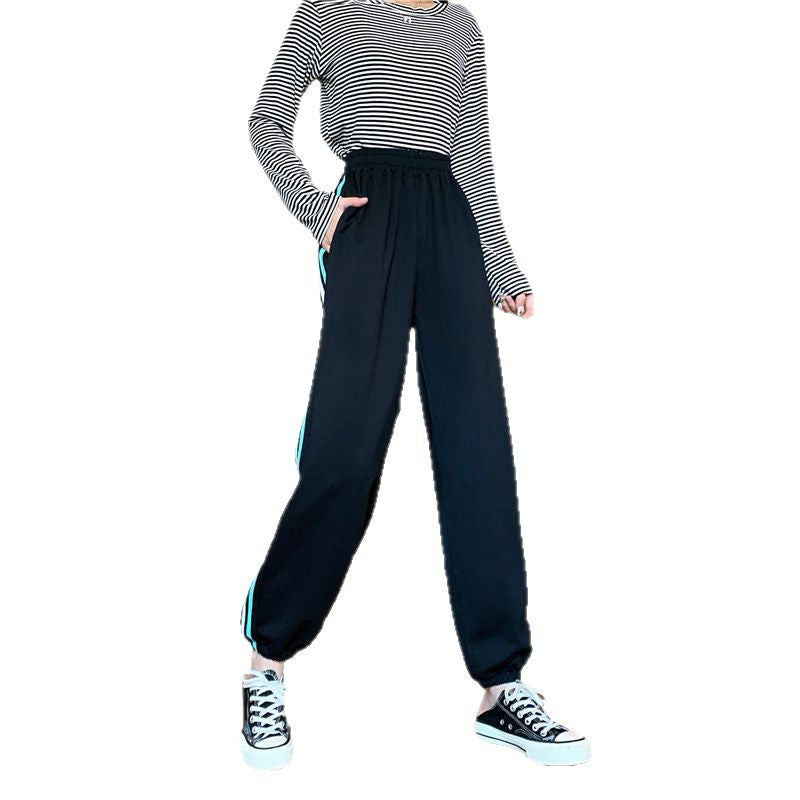 Dame sporty joggebukser med stilige sideninsert Skjora