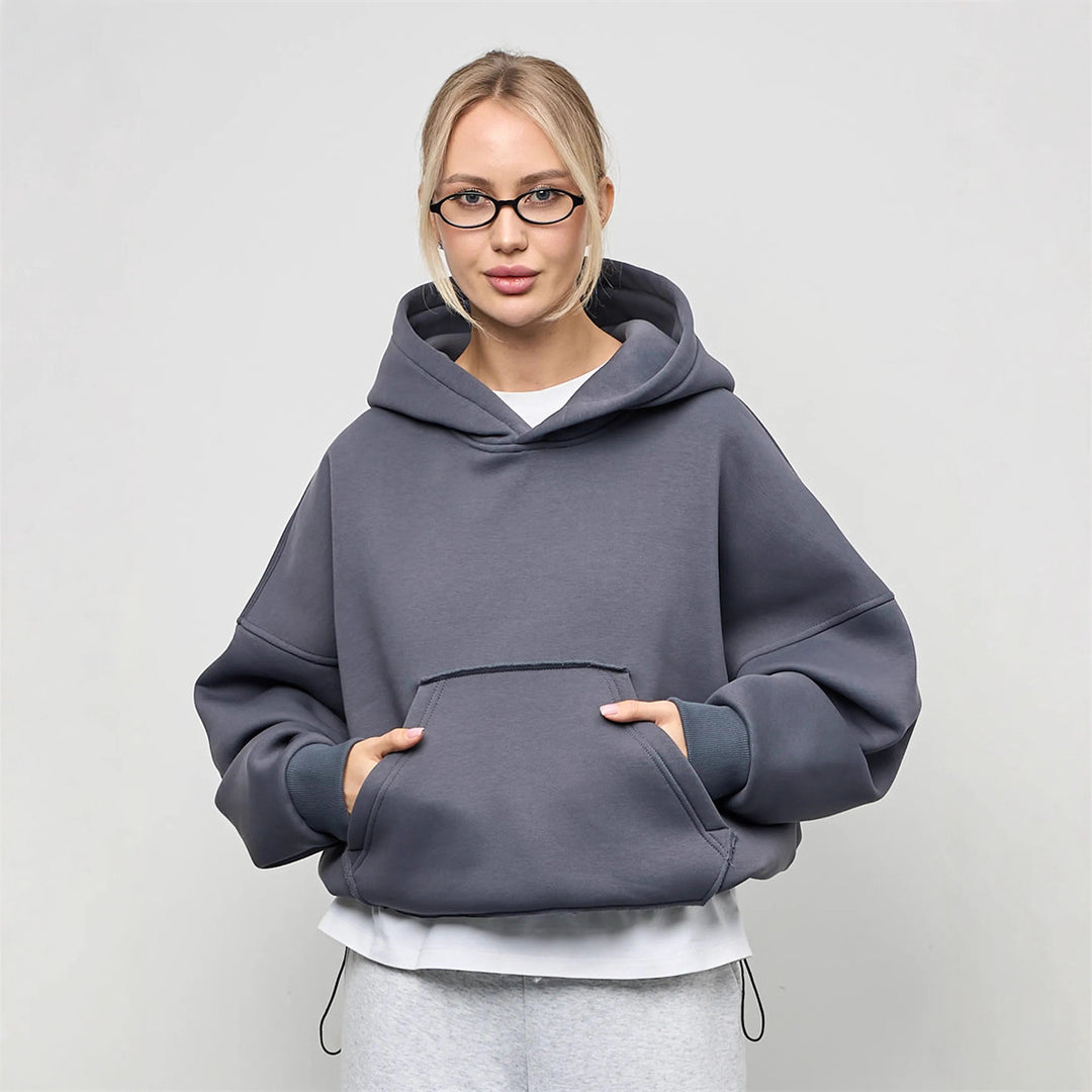 Dame oversized hettegenser med sidelommer og avslappet passform Skjora