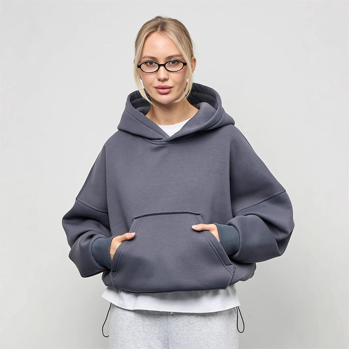 Dame oversized hettegenser med sidelommer og avslappet passform Skjora