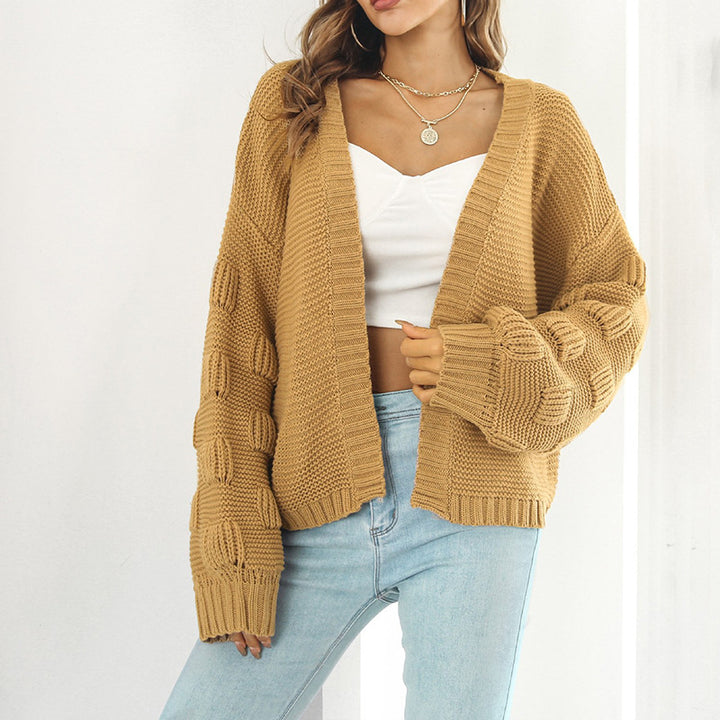 Kvinne chunky strikket cardigan med voluminøse ermer og åpen front Skjora