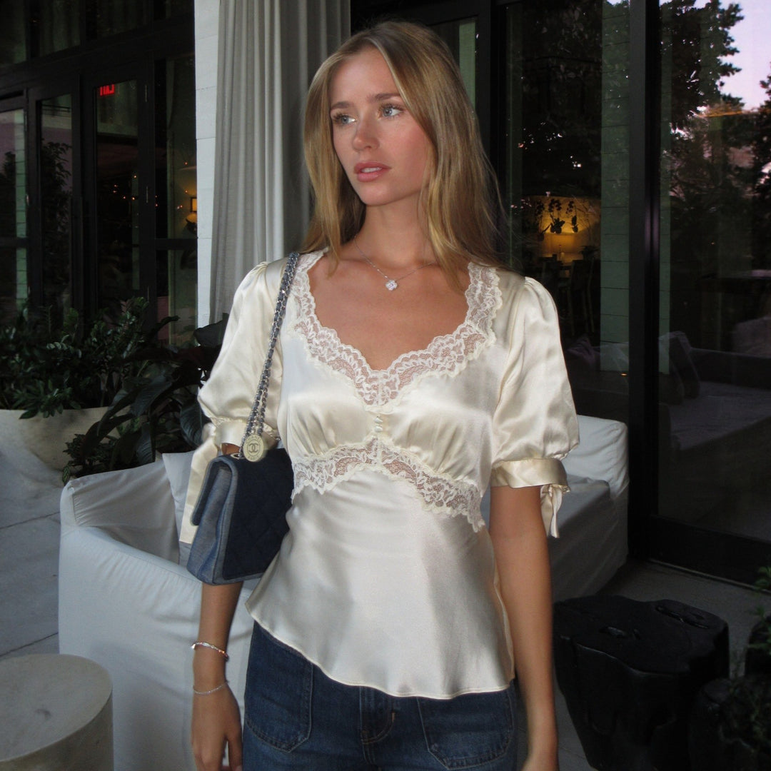 Ladies' satin blouse with pointed details Skjora