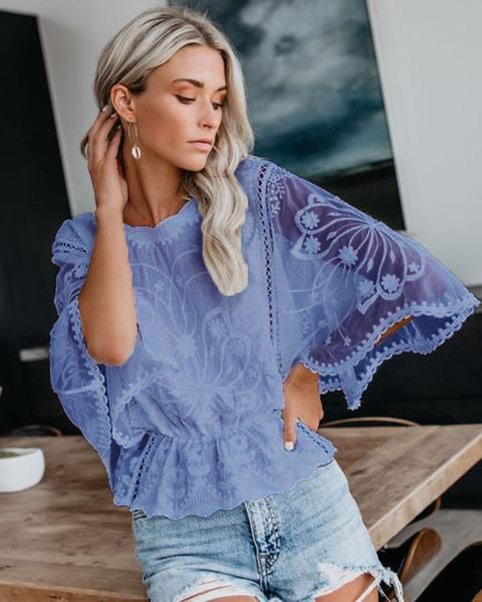 Kvinnes elegant bluse i blonde med voluminøse ermer Skjora