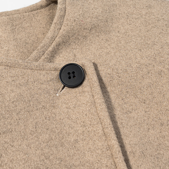 Dame elegant kort jakke i moderne design med asymmetrisk snitt Skjora