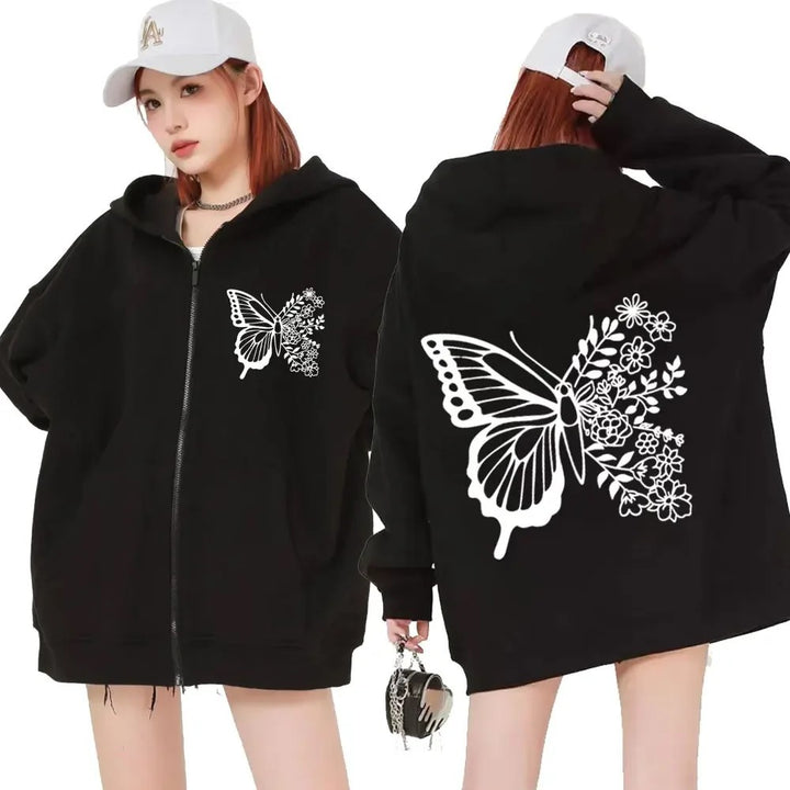Dame hoodie med blomster sommerfuglmotiv og praktisk kengurulomme Skjora