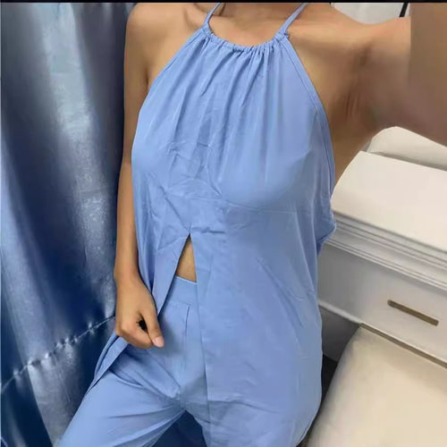 Dame Elegant to-delt sett med stilfull kåpe og cropped bukser Skjora