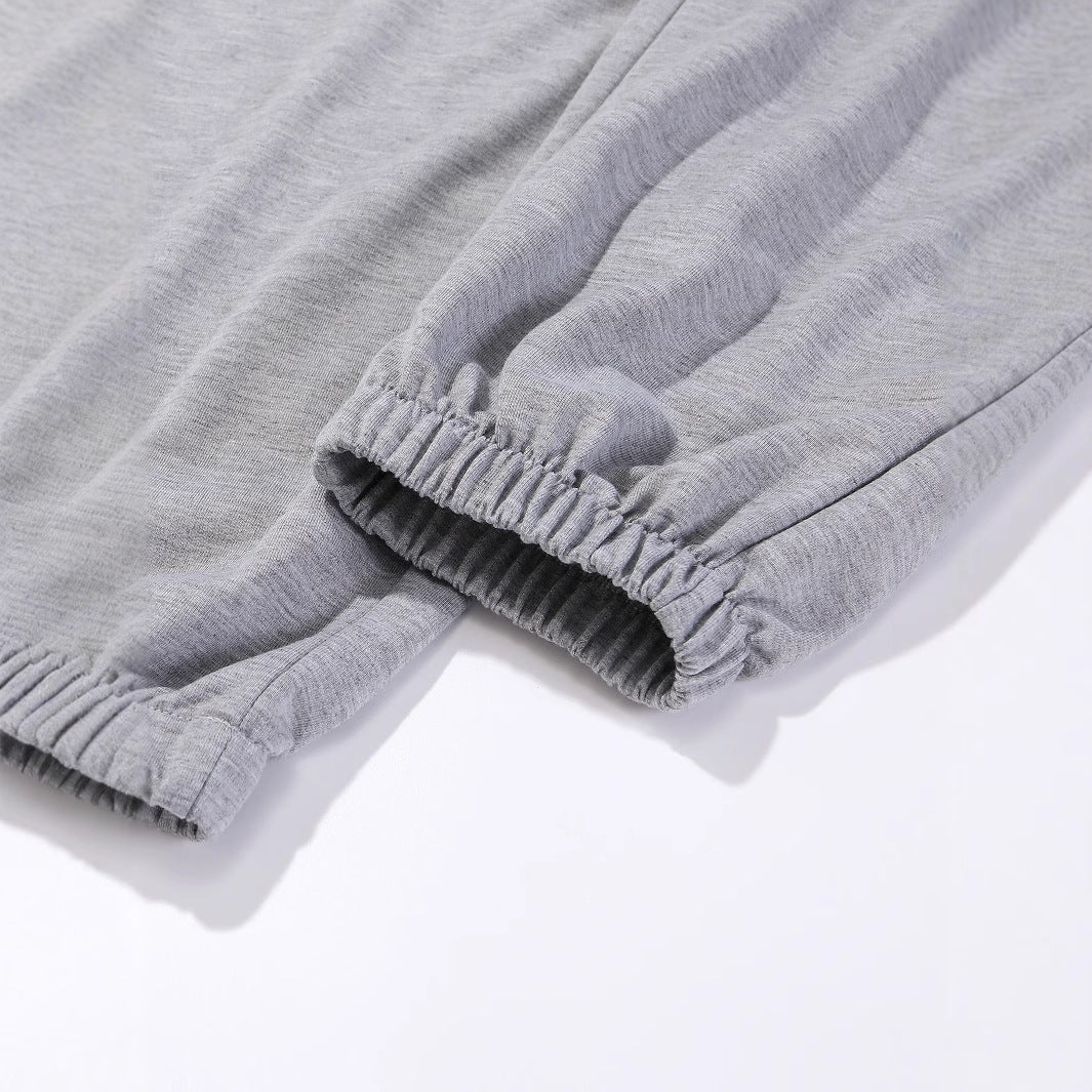 Kvinnenes komfortable joggebukser med trendy solmotiv Skjora