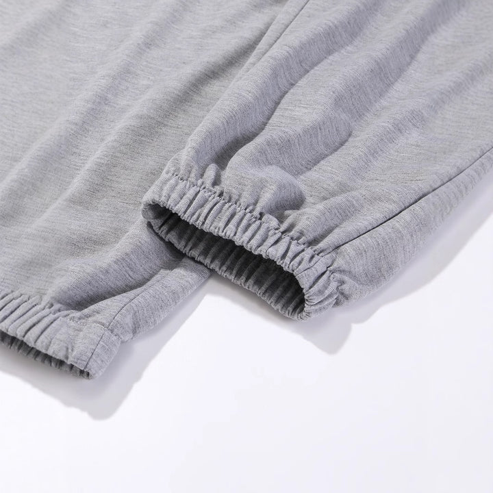 Kvinnenes komfortable joggebukser med trendy solmotiv Skjora