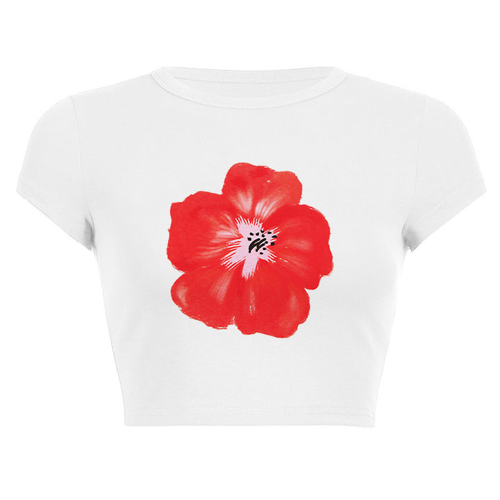 Damer ermeløs topp med blomsterlig hibiskus-motiv Skjora