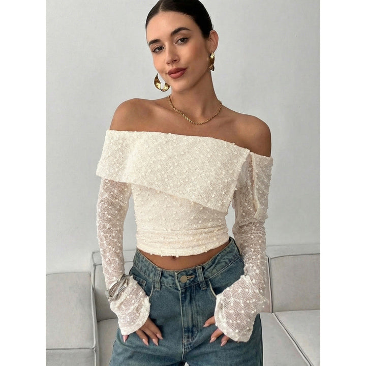 Dame Off-Shoulder topp med elegante volangdetaljer og lange ermer Skjora