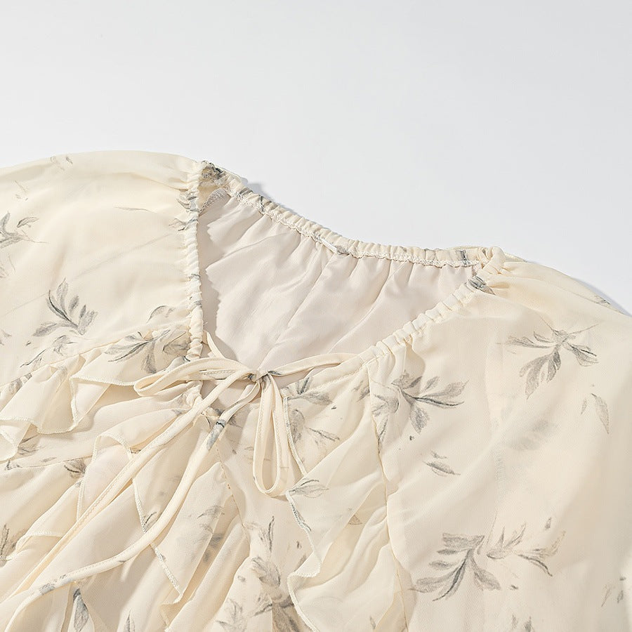 Dame Maxikjole med elegante volangdetaljer og blomstermønster Skjora