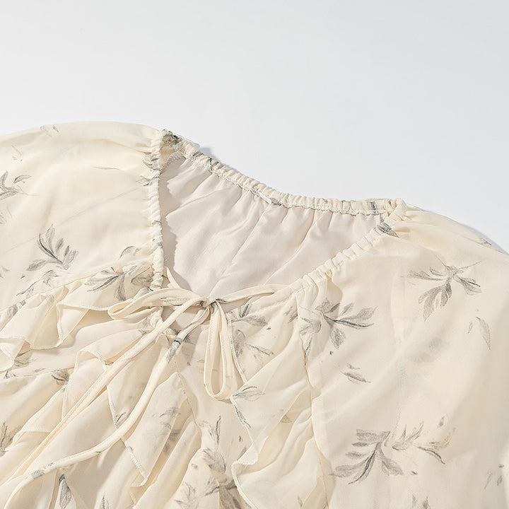 Dame Maxikjole med elegante volangdetaljer og blomstermønster Skjora