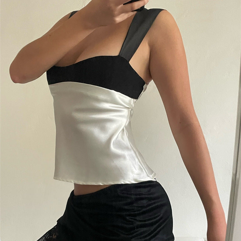 Dame stilfull topp med unik kutt og elegante stropper Skjora