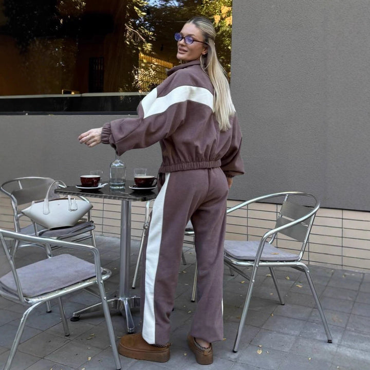 Dame fleece treningsdrakt med moderne glidelås og stripete design Skjora