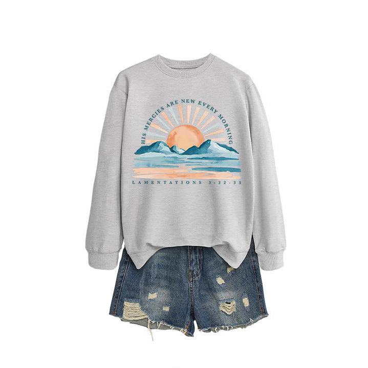 Kvinne sweatshirt med inspirerende soloppgang design og avslappet passform Skjora