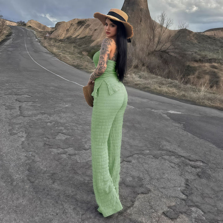 Dame elegant jumpsuit med off-shoulder design og asymmetrisk hem Skjora