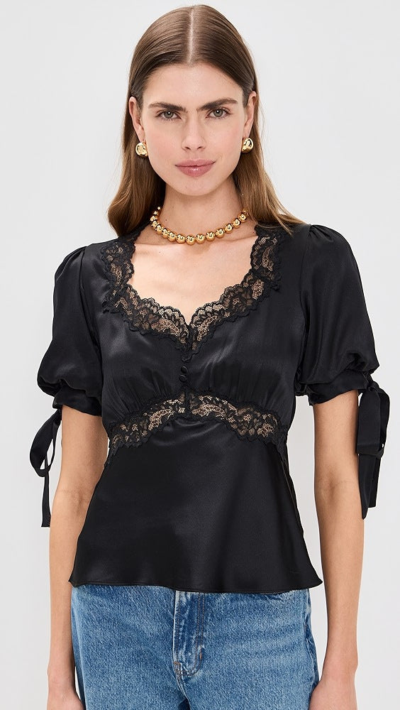 Ladies' satin blouse with pointed details Skjora