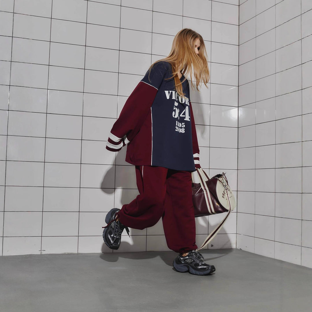 Kvinne Oversized Treningsdrakt med Grafisk Trykk og Bred Bukse Skjora